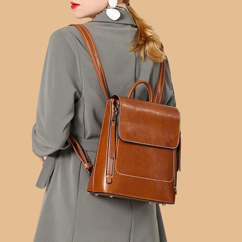 本革女性バックパックショルダーメッセンジャーバッグレトロ本物 - Genuine Leather Backpack のレビューと価格